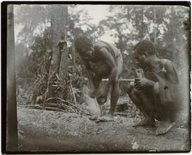 Local man making fire New Guinea