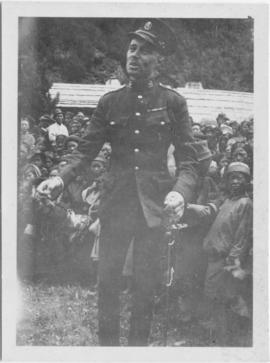 Soldier standing in front of a crowd