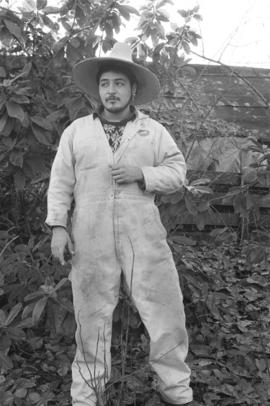 [Ron Telek wearing coveralls and hat]