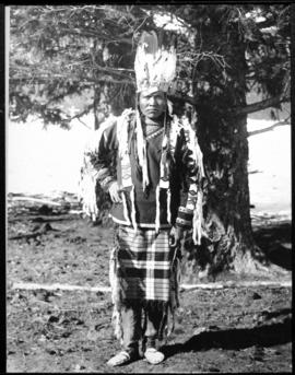 Portrait of young adult male in native dress