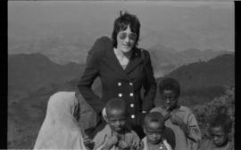 Lorna R. Marsden with a group of children
