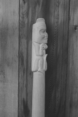[Side profile of carving]