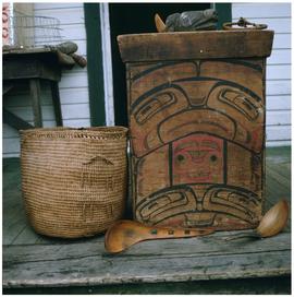 Skidegate basket and wooden carvings