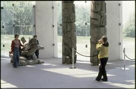 Children being photographed on the Wasgo sculpture