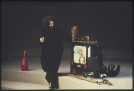 Garbanzo the Clown performs with props