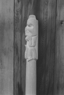 [Side profile of carving]