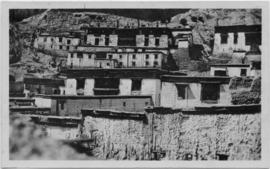 View of houses built against a hillside