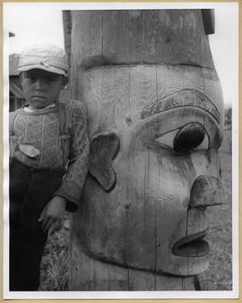Child and totem pole