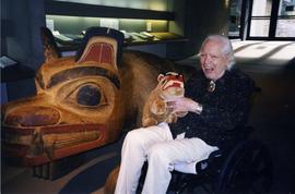 [Bill Reid with stuffed toy and artwork]