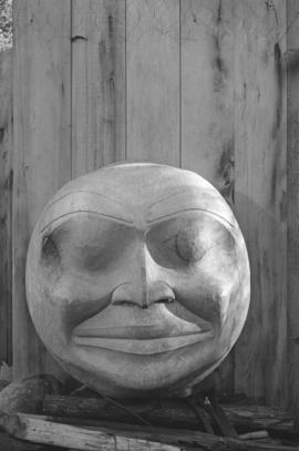 [Large carving of a face]