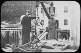Rev. J.B. McCullagh, Miss Chambers & a porpoise