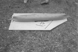 [Underside of model canoe]