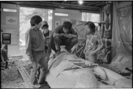 Crew and log at the old UBC carving shed