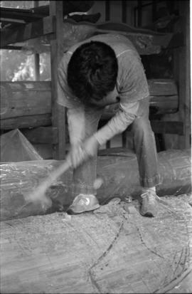 Crew and log at the old UBC carving shed