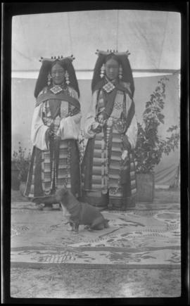 Two Tibetan women in full dress front view