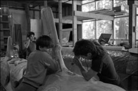 Crew and log at the old UBC carving shed