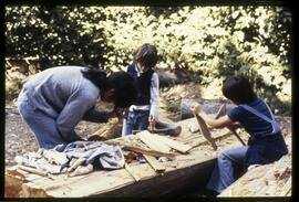 Children learning to carve