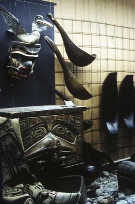 A bentwood box, mask, spoons and other items on display in Montréal