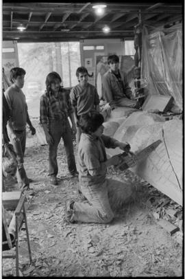 Crew and log at the old UBC carving shed