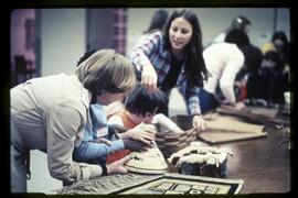 Children being shown belongings