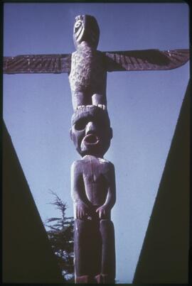 Dzunuk'wa totem pole with thunderbird