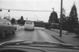 [Truck with log] turning at Hastings & Cassiar