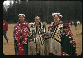 Three women and girl in ceremonial dress, Alert Bay (?)