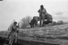 [Ron, Chip, Norman and Isaac marking log before shaping]