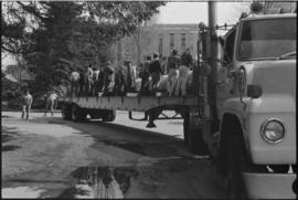 Crew moving log from the Turnbull & Gail construction yard in Richmond (contractors for build...