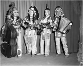 Dan George & band in traditional clothing
