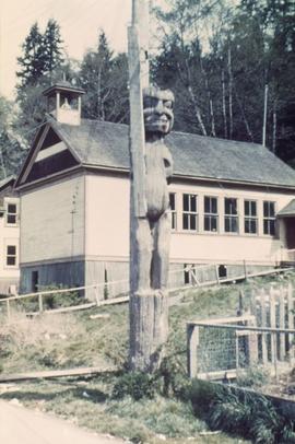 Unidentified pole in village, near church or schoolhouse (?)