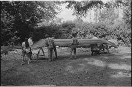 Crew and log at the old UBC carving shed