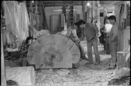Crew and log at the old UBC carving shed