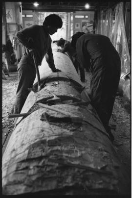 Crew and log at the old UBC carving shed