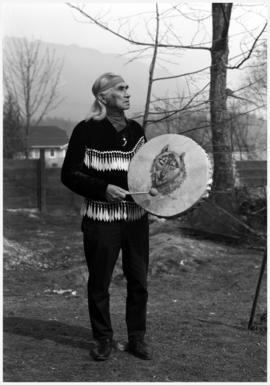 Hon. Chief Dan George, Burrard Reserve [Tsleil-Waututh], North Vancouver with drum painted by Min...