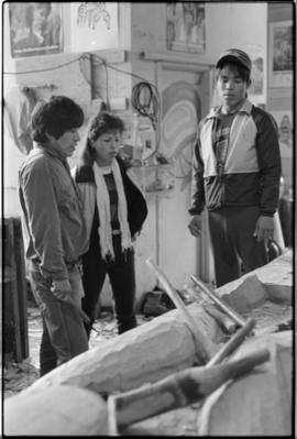 Crew and log at the old UBC carving shed