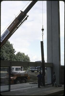 Totem pole support being moved