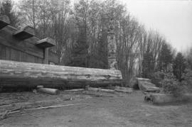 [Measuring length of canoe log]