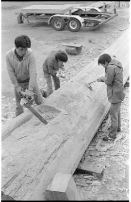 Crew working on log at the Turnbull & Gail construction yard in Richmond (contractors for bui...