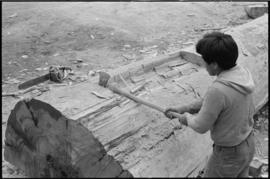 Crew working on log at the Turnbull & Gail construction yard in Richmond (contractors for bui...