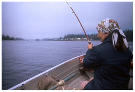 From all over the place, woman fishing