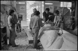 Crew and log at the old UBC carving shed