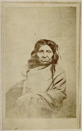 [Portrait of elder in blanket]