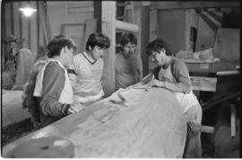 Crew and log at the old UBC carving shed