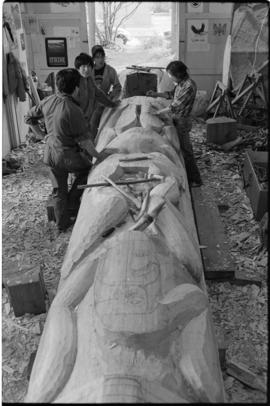 Crew and log at the old UBC carving shed