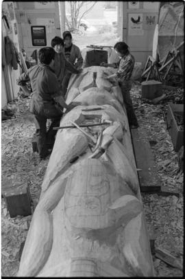 Crew and log at the old UBC carving shed