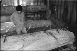 Crew and log at the old UBC carving shed