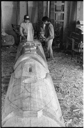 Crew and log at the old UBC carving shed