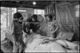 Crew and log at the old UBC carving shed