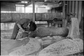 Crew and log at the old UBC carving shed